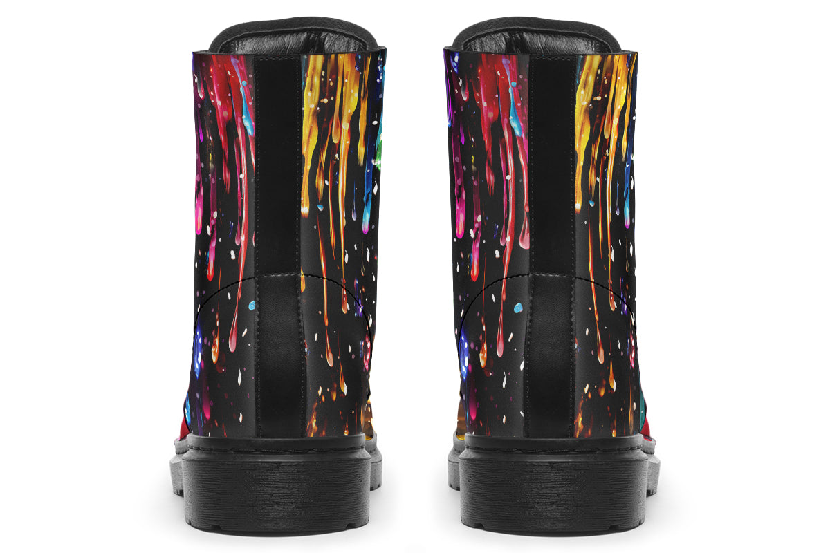 Black boots with a design that looks like different coloured paints dripping down the boots