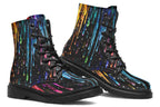 Black boots with a design that looks like different coloured paints dripping down the boots