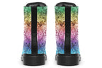 Boots featuring a pastel rainbow gradient pattern with a dark textured overlay to give it a grunge, aged look.