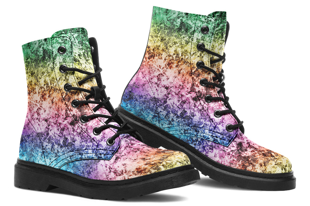 Boots featuring a pastel rainbow gradient pattern with a dark textured overlay to give it a grunge, aged look.