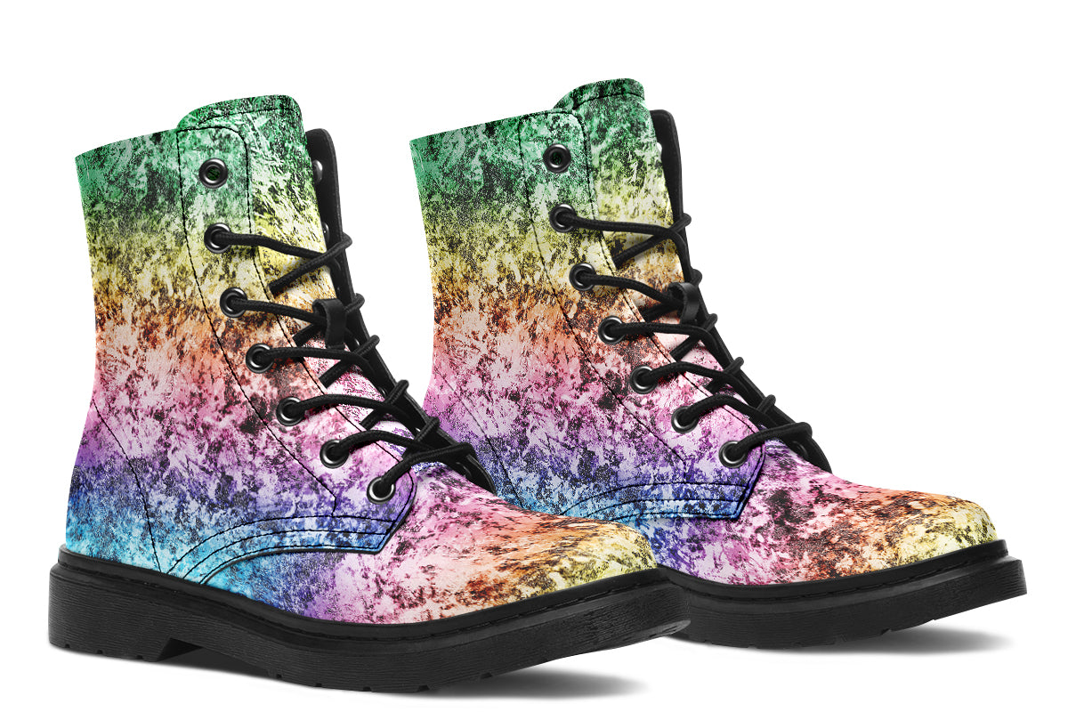 Boots featuring a pastel rainbow gradient pattern with a dark textured overlay to give it a grunge, aged look.