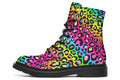 Boots featuring a colourful leopard print over a rainbow coloured background.