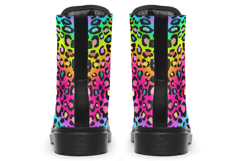 Boots featuring a colourful leopard print over a rainbow coloured background.