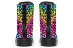 Boots featuring a colourful leopard print over a rainbow coloured background.