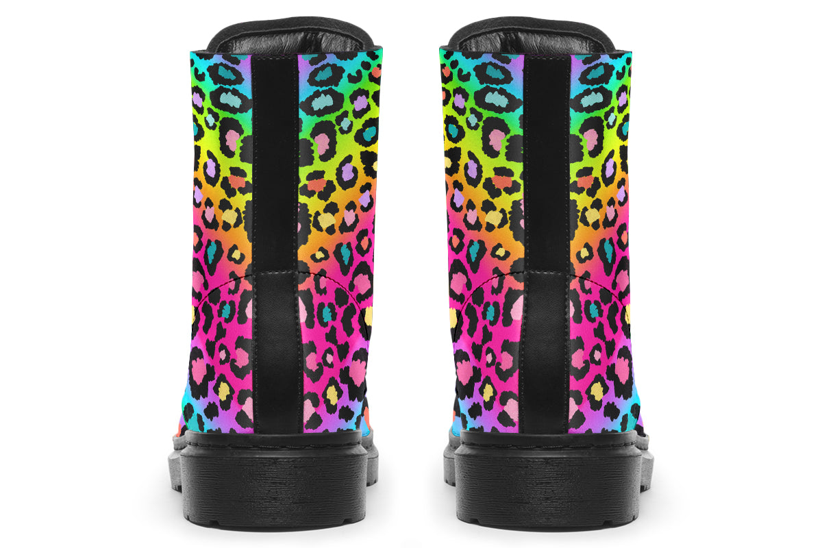 Boots featuring a colourful leopard print over a rainbow coloured background.