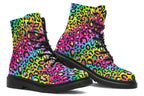 Boots featuring a colourful leopard print over a rainbow coloured background.