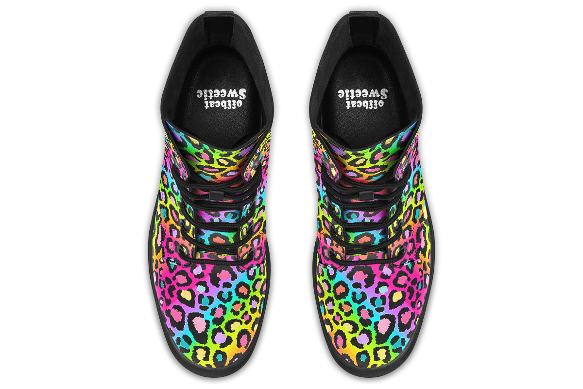 Boots featuring a colourful leopard print over a rainbow coloured background.