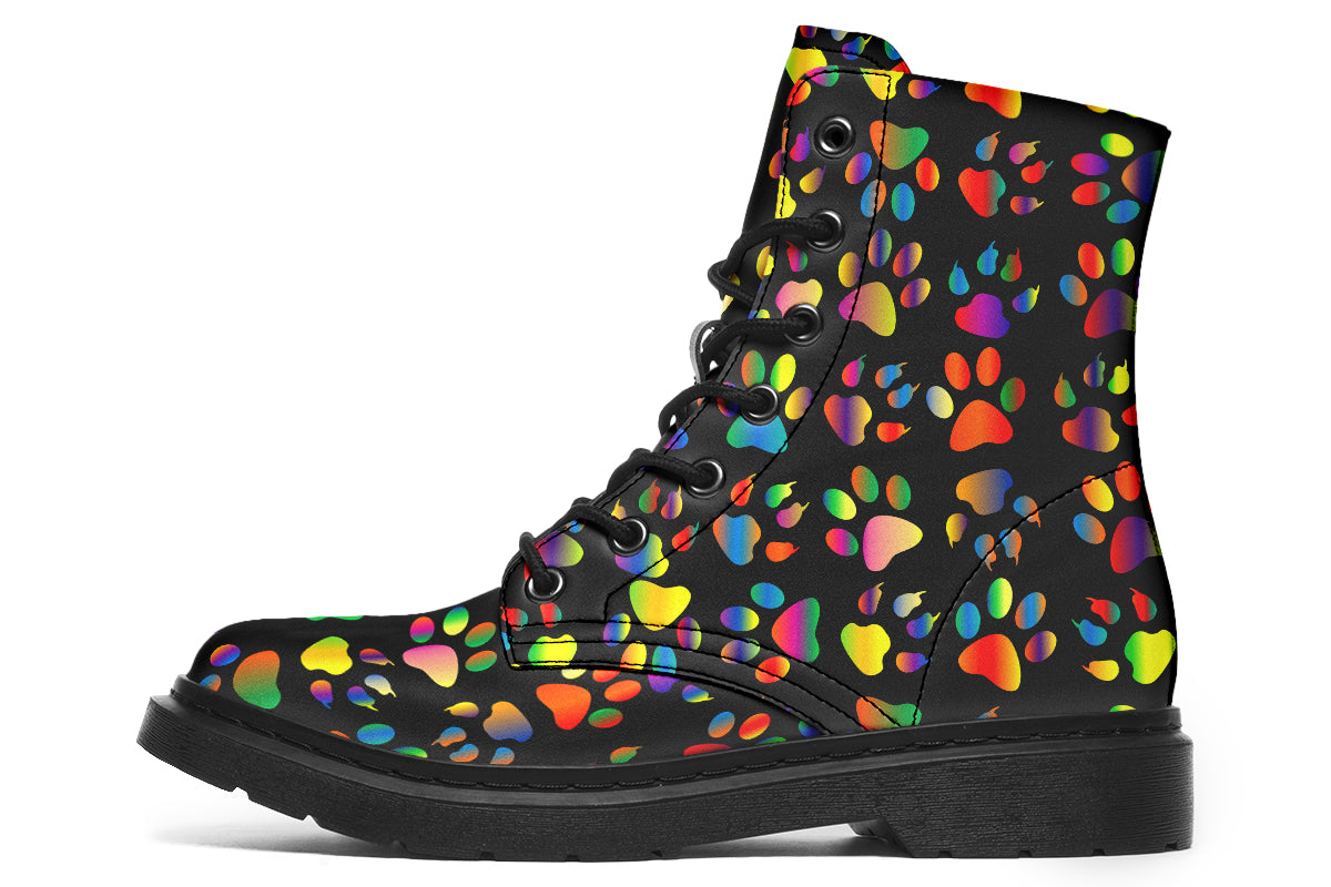 Black boots featuring a rainbow gradient paw print pattern