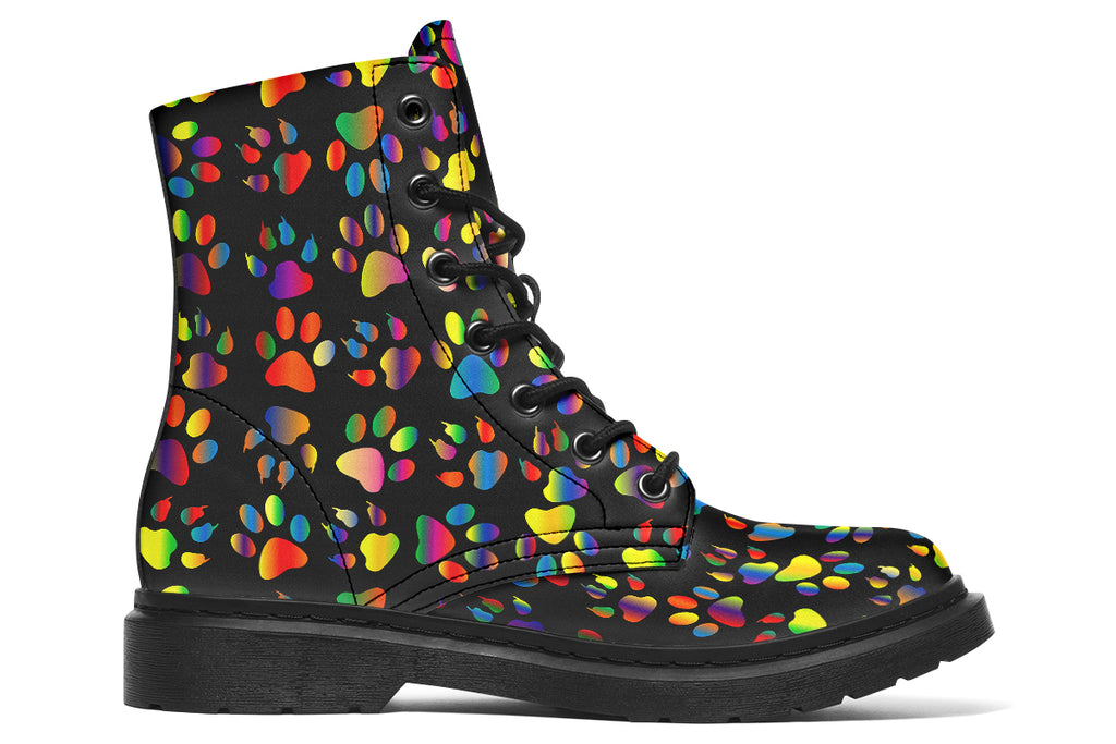 Black boots featuring a rainbow gradient paw print pattern