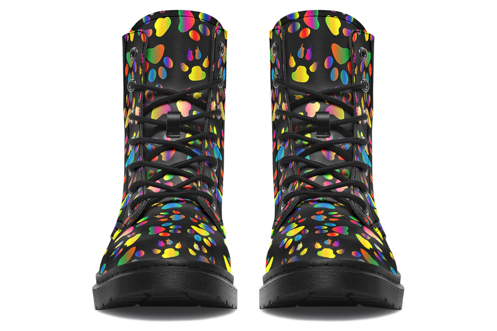 Black boots featuring a rainbow gradient paw print pattern