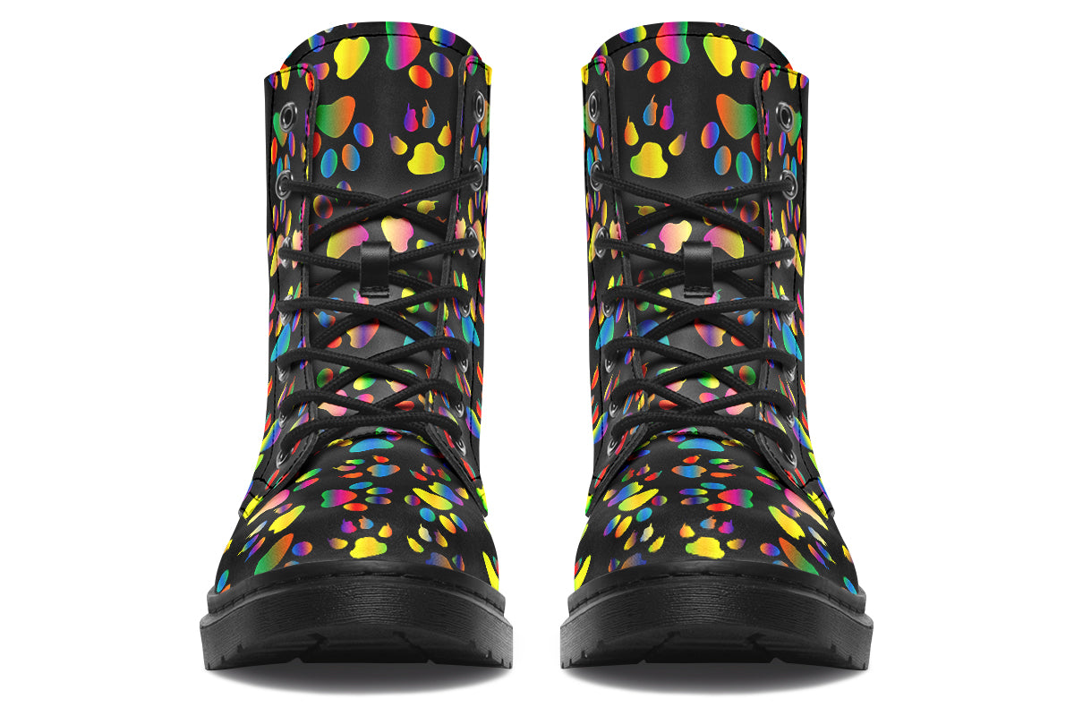 Black boots featuring a rainbow gradient paw print pattern