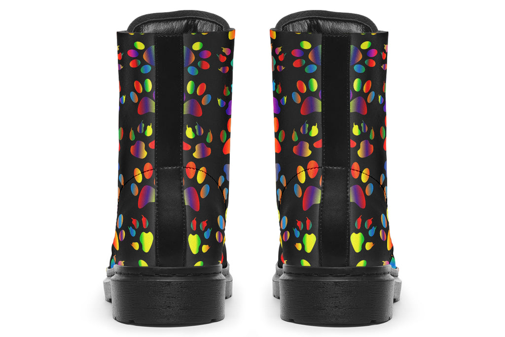 Black boots featuring a rainbow gradient paw print pattern