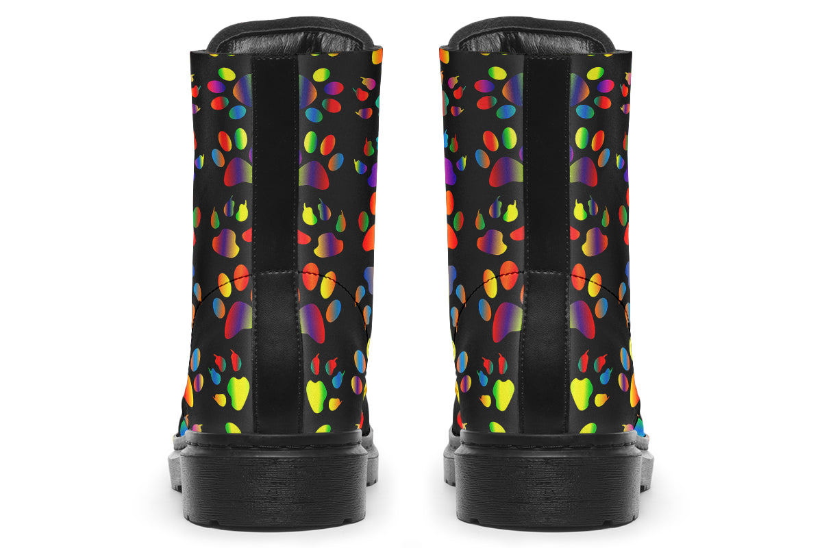 Black boots featuring a rainbow gradient paw print pattern