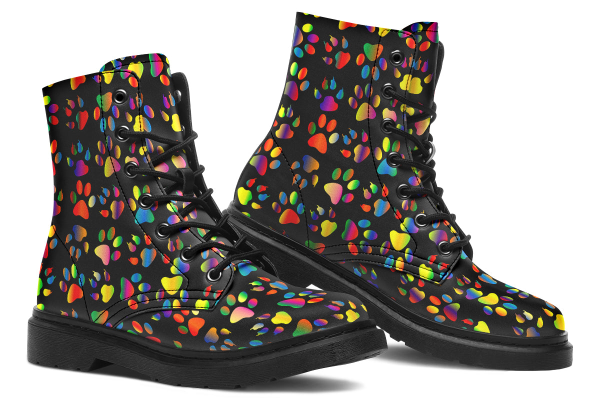 Black boots featuring a rainbow gradient paw print pattern