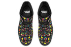 Black boots featuring a rainbow gradient paw print pattern