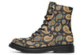 Deep navy blue boots with a paisley pattern in browns, greens and creams
