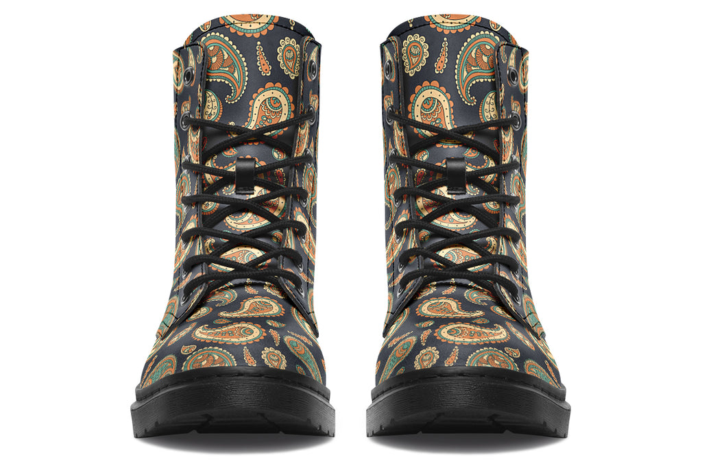Deep navy blue boots with a paisley pattern in browns, greens and creams