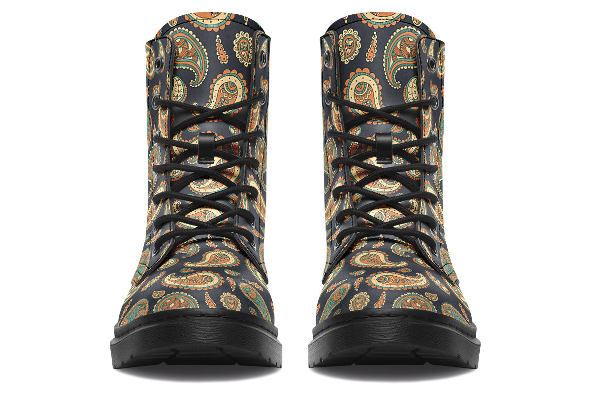 Deep navy blue boots with a paisley pattern in browns, greens and creams