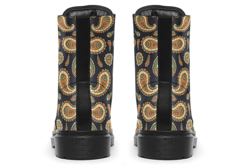 Deep navy blue boots with a paisley pattern in browns, greens and creams