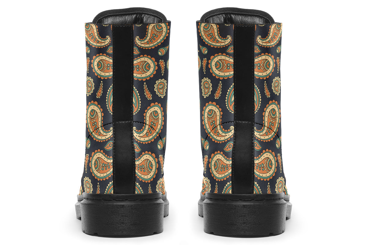 Deep navy blue boots with a paisley pattern in browns, greens and creams