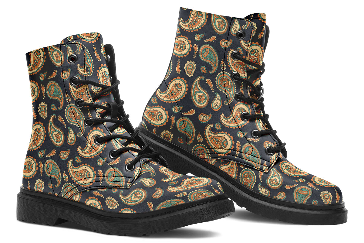 Deep navy blue boots with a paisley pattern in browns, greens and creams