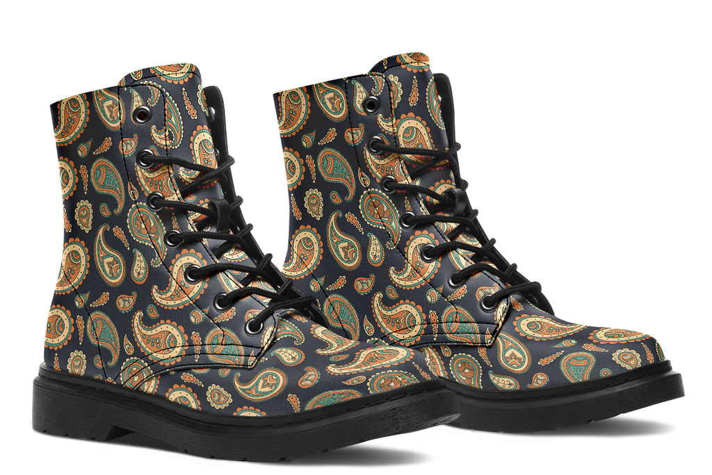 Deep navy blue boots with a paisley pattern in browns, greens and creams