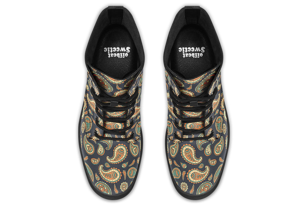 Deep navy blue boots with a paisley pattern in browns, greens and creams