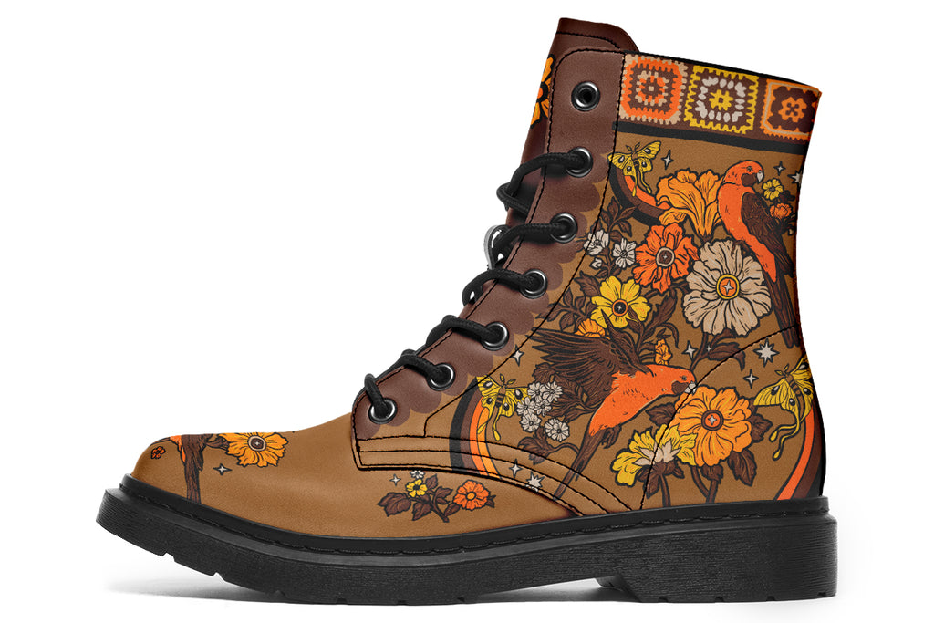 Tan brown boots with a rosella and floral design in retro colours of oranges, mustard yellows and browns. It features a patchwork pattern across the top of the boots.