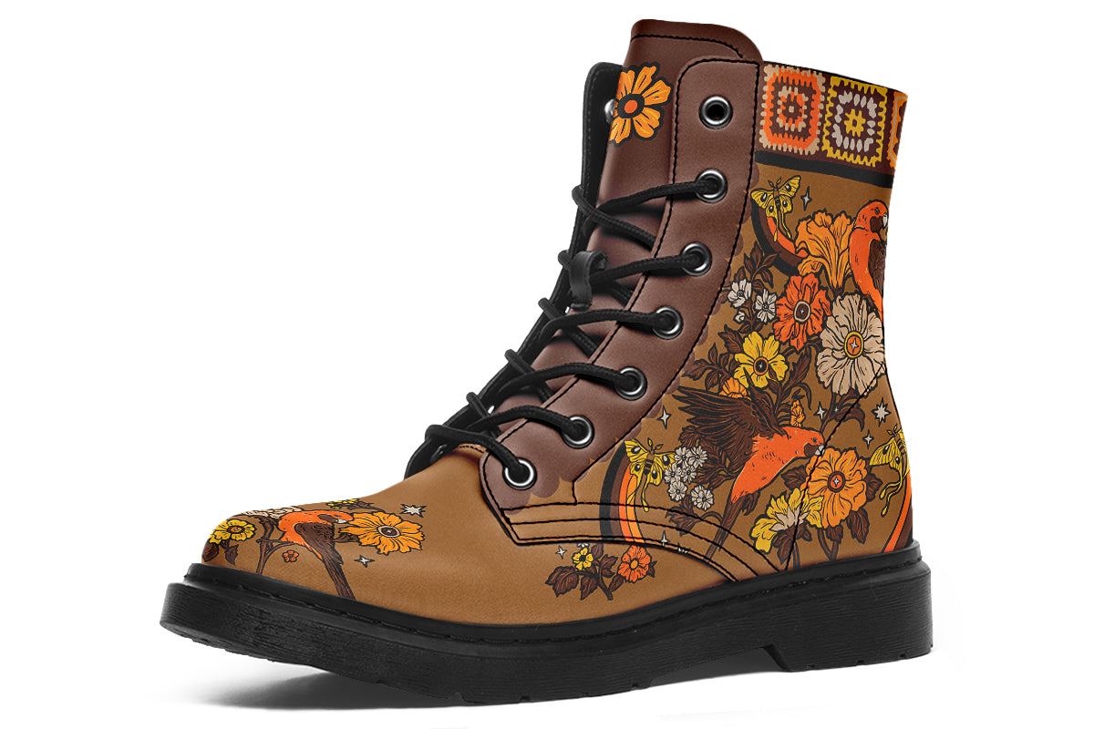 Tan brown boots with a rosella and floral design in retro colours of oranges, mustard yellows and browns. It features a patchwork pattern across the top of the boots.
