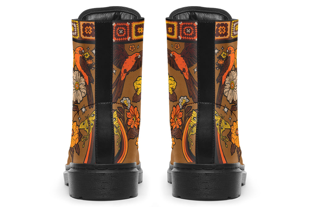 Tan brown boots with a rosella and floral design in retro colours of oranges, mustard yellows and browns. It features a patchwork pattern across the top of the boots.