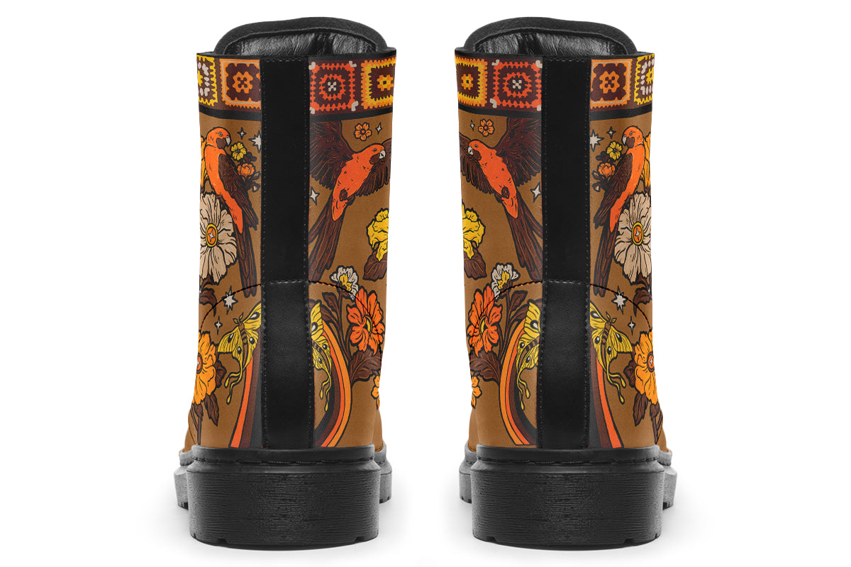 Tan brown boots with a rosella and floral design in retro colours of oranges, mustard yellows and browns. It features a patchwork pattern across the top of the boots.