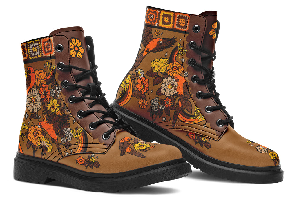 Tan brown boots with a rosella and floral design in retro colours of oranges, mustard yellows and browns. It features a patchwork pattern across the top of the boots.
