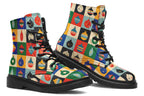 These boots feature a pattern of many squares, with each square having a different Christmas bauble in it and a different coloured background such as cream, mustard yellow, red, green and blue. 