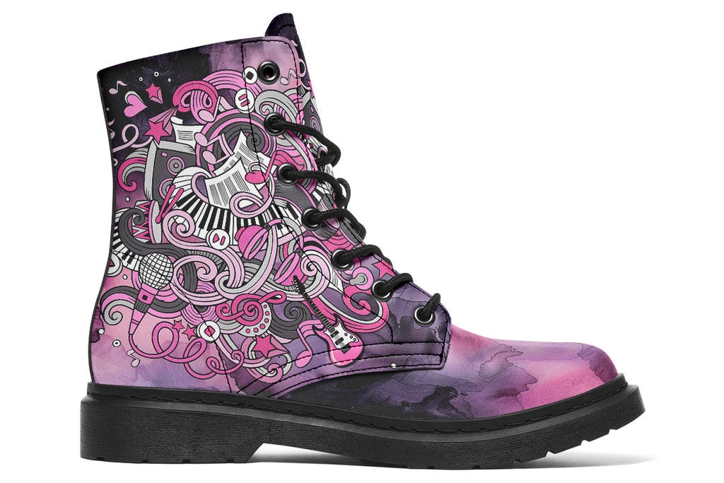 Purple and pink music-themed patterned boot with black sole. Design shows musical instruments, treble clefs, sheet music etc amongst decorative swirls.