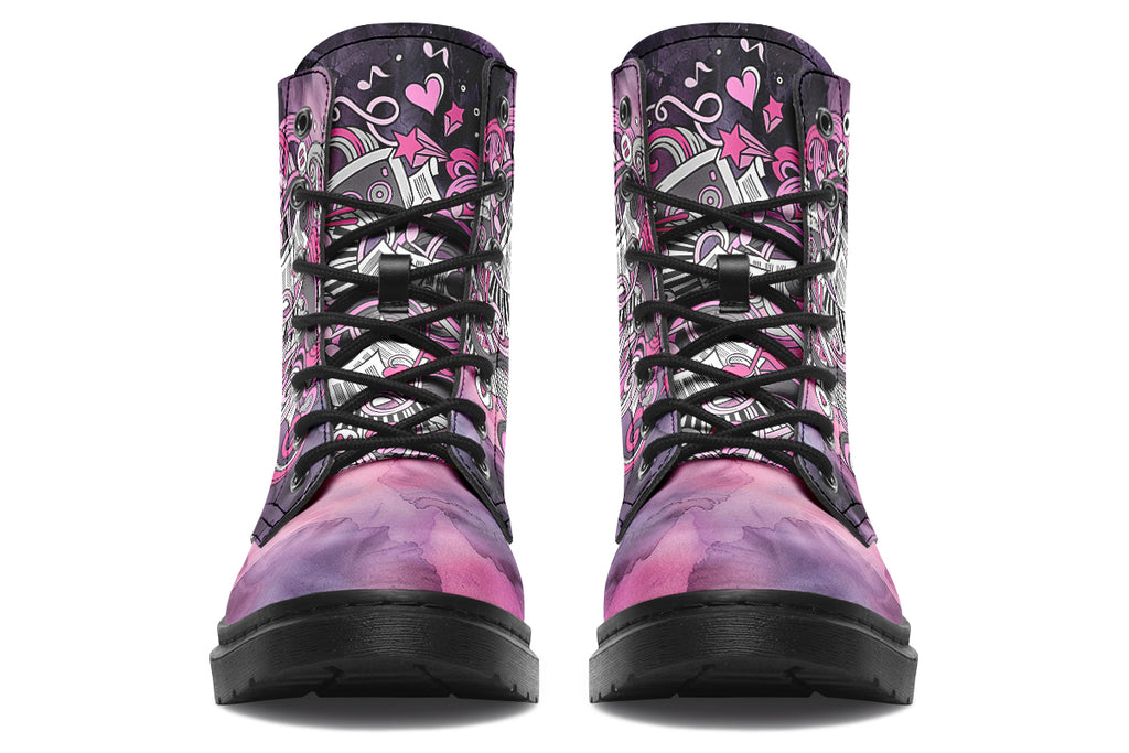 Purple and pink music-themed patterned boot with black sole. Design shows musical instruments, treble clefs, sheet music etc amongst decorative swirls.