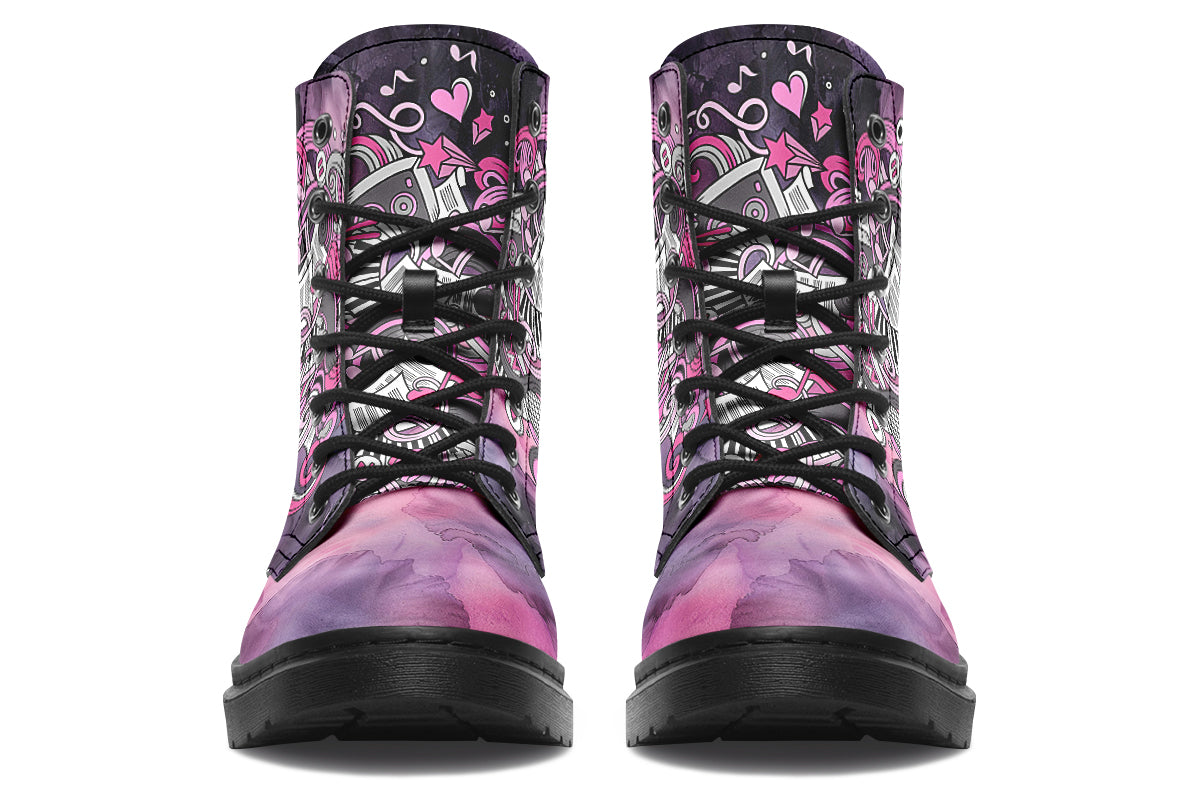 Purple and pink music-themed patterned boot with black sole. Design shows musical instruments, treble clefs, sheet music etc amongst decorative swirls.