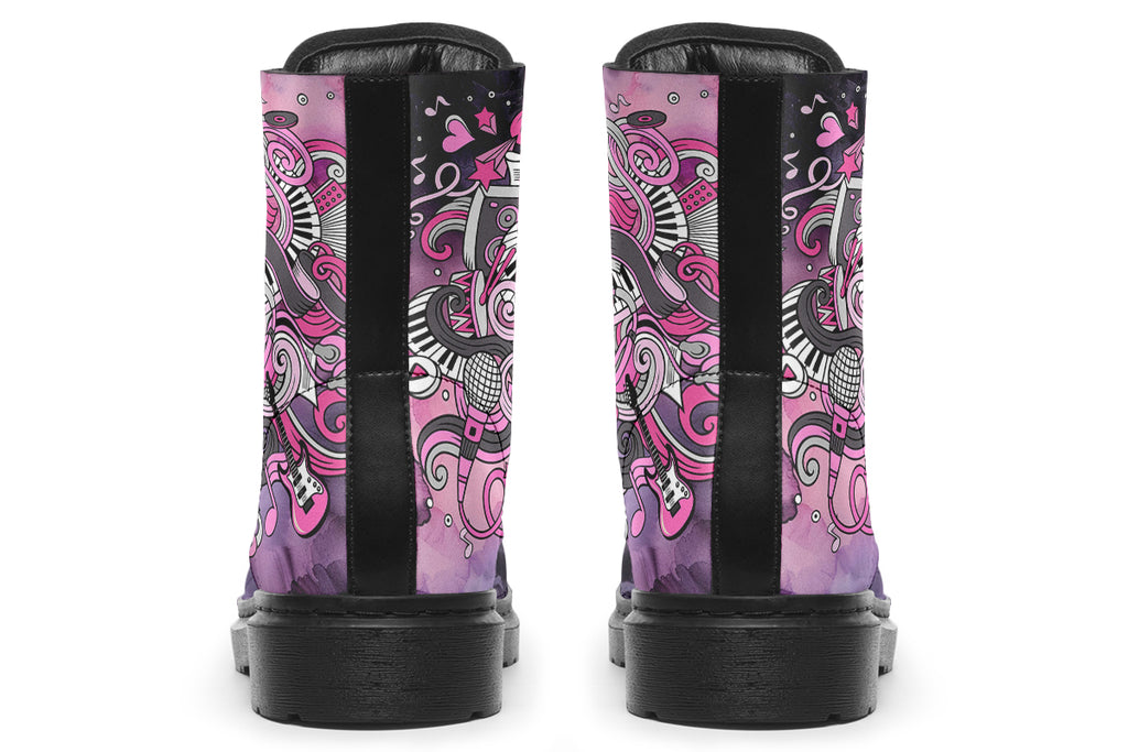 Purple and pink music-themed patterned boot with black sole. Design shows musical instruments, treble clefs, sheet music etc amongst decorative swirls.