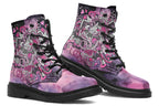 Purple and pink music-themed patterned boot with black sole. Design shows musical instruments, treble clefs, sheet music etc amongst decorative swirls.