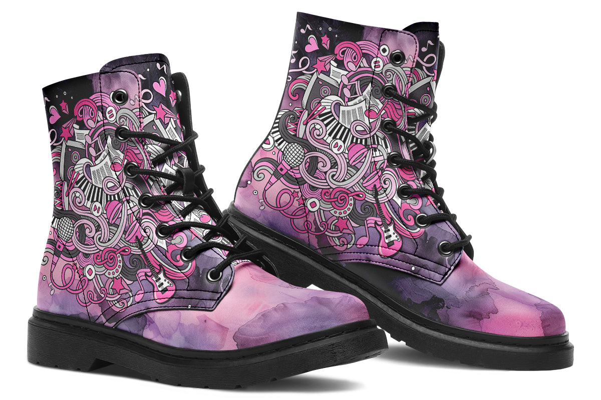 Purple and pink music-themed patterned boot with black sole. Design shows musical instruments, treble clefs, sheet music etc amongst decorative swirls.