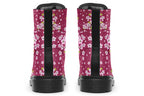Boots featuring a pink and white floral pattern on a dark reddish pink background