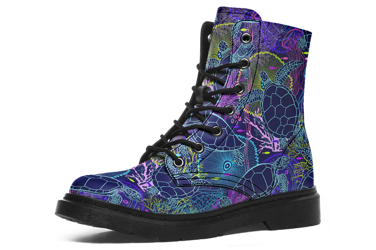 Boots with a black sole and sea-turtle themed design in hues of blues and purples.