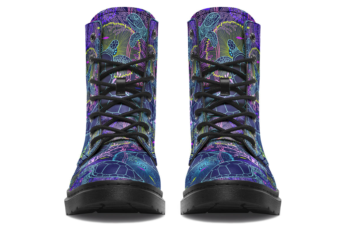 Boots with a black sole and sea-turtle themed design in hues of blues and purples.