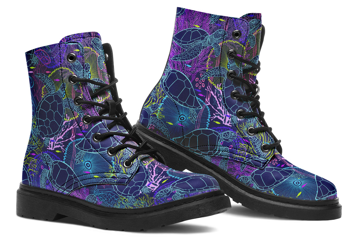 Boots with a black sole and sea-turtle themed design in hues of blues and purples.