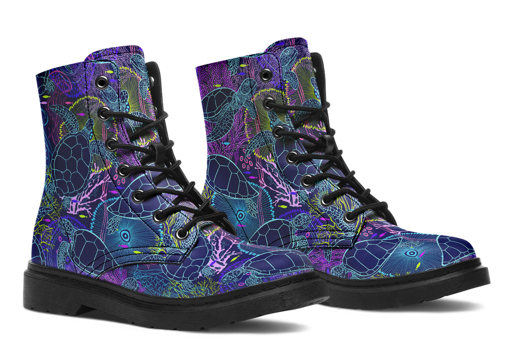 Boots with a black sole and sea-turtle themed design in hues of blues and purples.