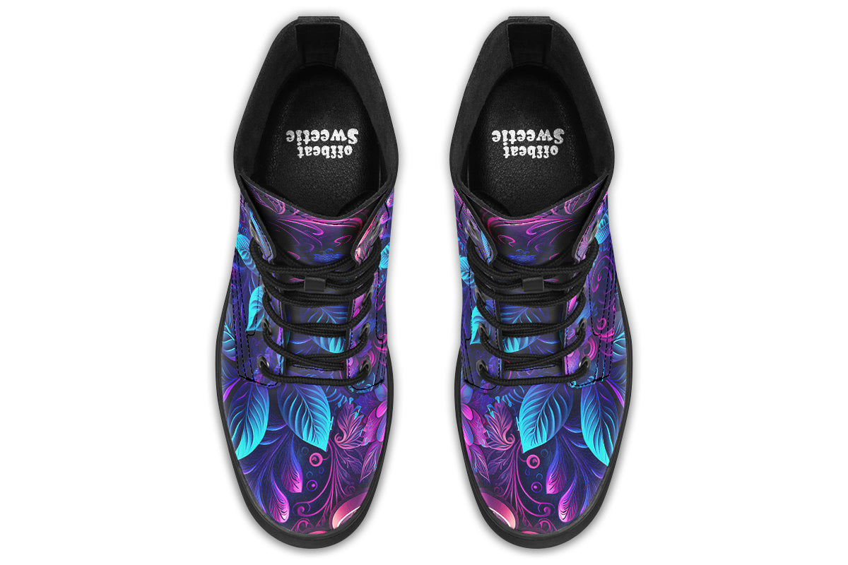 Dark purple boots featuring a leafy floral design in hues of purples and blues