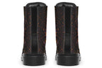 Very dark brown boots with bronze spiderweb patterns on them