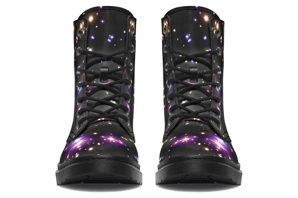 Black space-themed boots with white and purple star patterns all over them