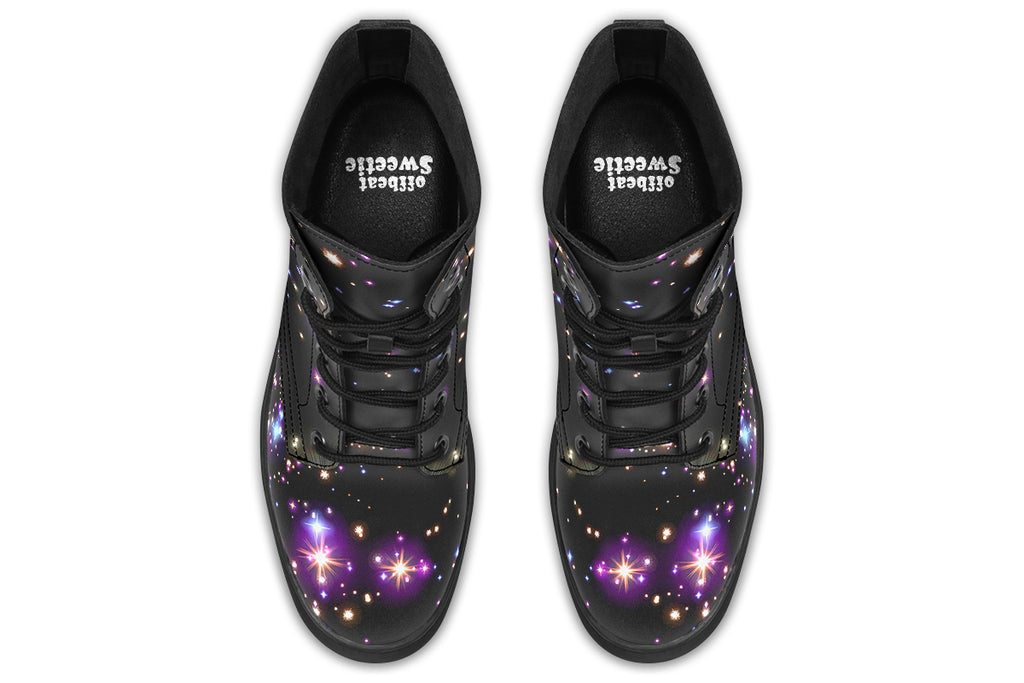 Black space-themed boots with white and purple star patterns all over them