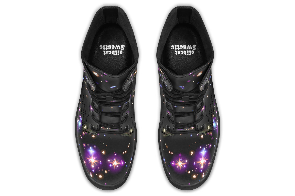 Black space-themed boots with white and purple star patterns all over them
