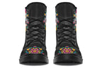 Black boots with a sugar skull design on each side, with a rainbow pattern on the skull and different colours flowers coming out from behind the skull. The toes of the boots feature a matching flower design.